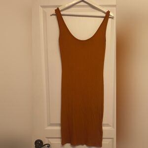 Beautiful summer dress in a rich orange color. Very elastic and very comfortable